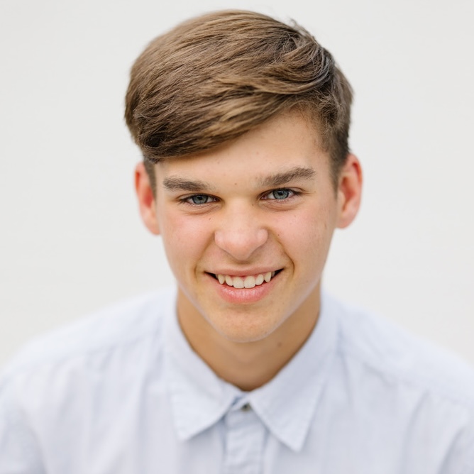 A headshot of Austin Long